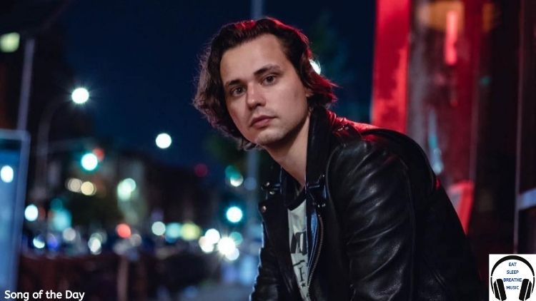 White Man Sitting Wearing a Leather Jacket outside in a city | Russell Jamie Johnson Song of the Day |Eat Sleep Breathe Music