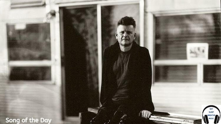 1st Base Runner Musician Sitting on a piano in a black and white photo | Eat Sleep Breathe Music
