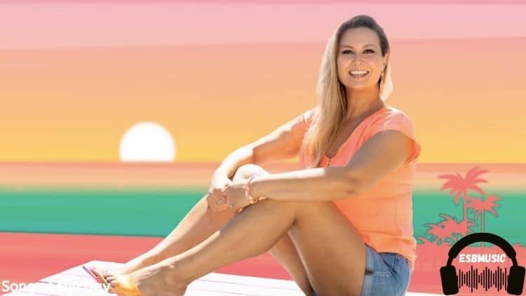 Musician Emery Pulse sitting on a pier | Gift Box song of the day feature | Eat Sleep Breathe Music